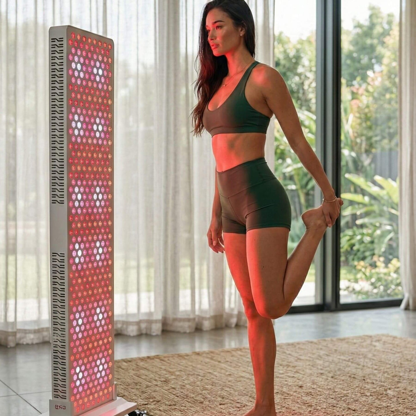 A woman doing yoga while using Pro Panel Ultra 
