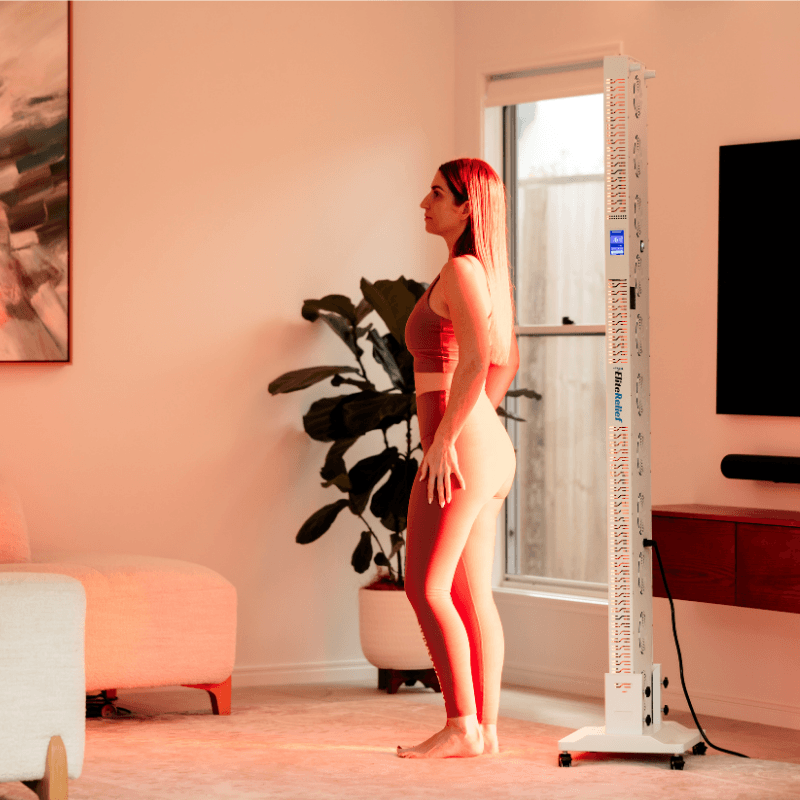 a woman using Pro Panel Elite on her back